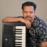 Manesh Nedumbaan Piano trainer in Thalapilly